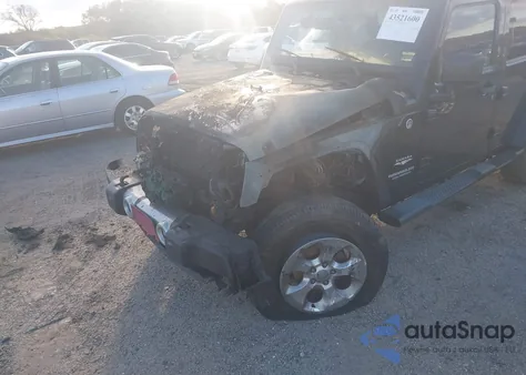 2013 Jeep Wrangler Unlimited Sahara из США, поврежденный, VIN 1C4BJWEG2DL609786